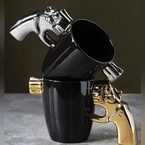 Black Mug with Silver and Gold Revolver Handle